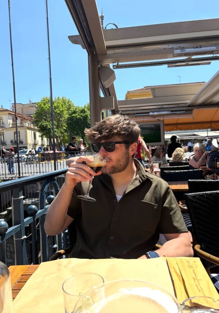 Dan Skelton at an outdoor cafe table
